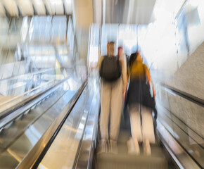 Blurred image of escalators in a mall