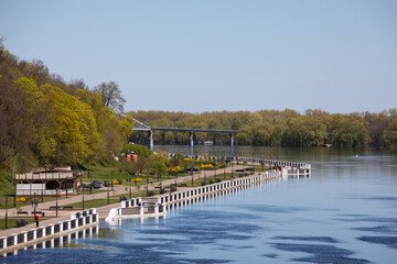 Landscape with river flooding, forest and embankment in the city in spring. Rivers of Belarus. the city of Gomel. Europe.