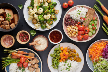 Healthy Organic Tofu and Rice Buddha Bowl with Veggies. Poke bowl with silken tofu, rice and mixed vegetables, carrots, asparagus, tomatoes, beans . Healthy vegetarian salad bowl.