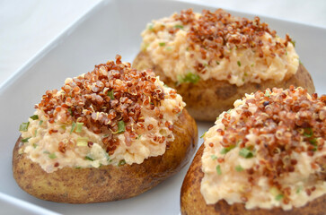 Loaded Healthy Baked Potato. With skin on, cheese, chives, and quinoa.