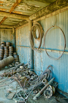 An Image of a Gold Miner's Storage Room Littered with Rusty Trash in Southern Georgia, US.