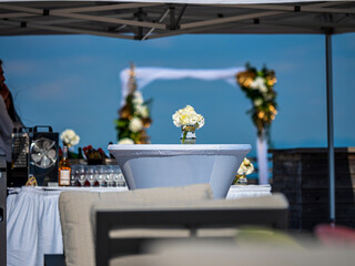 Wedding decorations. Decorated tables on a sunny terrace