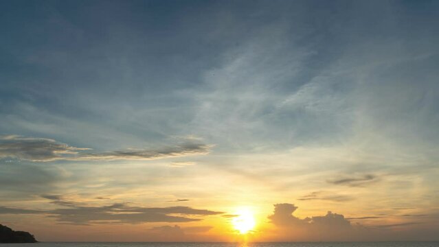 time lapse blue sky in sunset above the sea at Karon beach Phuket.
smooth cloudy sky at sunset at Karon beach Phuket. Gradient color. Sky texture, abstract nature background.
Sunset with strong color 