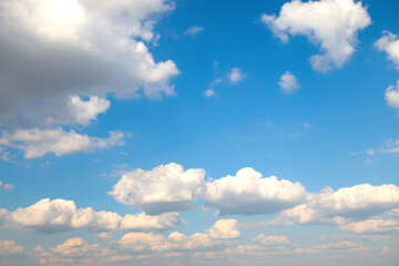 Defocus blue sky background with tiny white clouds. Panorama blue sky background with clouds. Abstract blurred piece background. Spring sky. Victory Ukraine. Out of focus