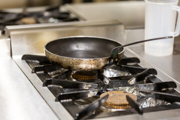 Empty pan on the kitchen stove