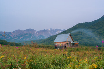 Forester's house in the mountains in the evening