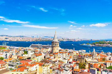 Fototapeta premium Aerial drone view of Galata Tower with cruise liner in Istanbul, Turkey. Summer sunny day
