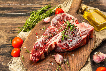 Classic T-bone steak isolated on white background. Hard light, dark shadow, mockup, template