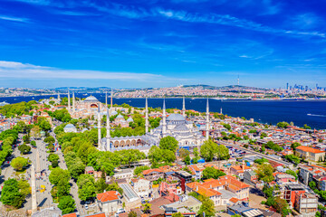 Hagia Sophia and Blue mosque in Sultanahmet district in Istanbul, Turkey. Aerial drone view