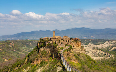 Fototapeta premium Panoramic aerial view of Civita di Bagnoregio with a view of the Calanchi Valley, Lazio, Bagnoregio, province of Viterbo.The most beautiful villages in Italy.The dying city