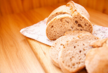 Fresh loaf of bread on the table, delicious homemade food