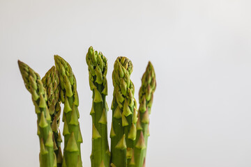 Asparagus spears with white background and negative space