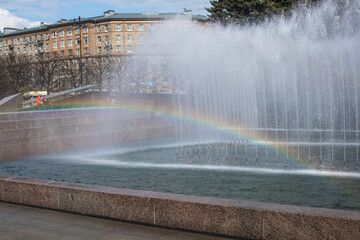 Rainbow over the fountain in the park