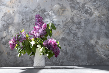 Spring lilac flower on dark background