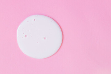 Smear of natural moisturizer in pink background. Cream, Lotion for face or body. Skin care.
