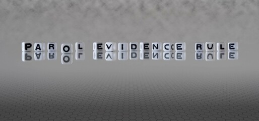 parol evidence rule word or concept represented by black and white letter cubes on a grey horizon...