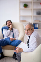 Young businessman employee visiting psychologist