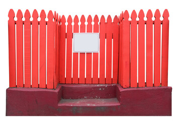 Fototapeta premium Isolated red picket fence with purple cement steps and blank sign for copy.