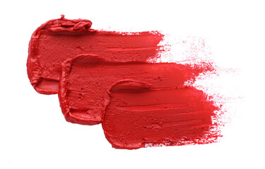 Smears of red lipstick on white background