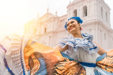 Foto op Aluminium Traditional dancer with a typical Nicaraguan costume dancing outside the cathedral of Leon Nicaragua celebrating the independence © Carlos