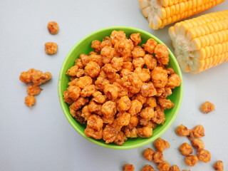 Homemde Jagung marning (Indonesia) or Corn nuts, also known as toasted corn, quico, or Cracker are a snack food made of roasted or deep-fried corn kernels.