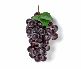 Dark red grapes, sweet fruit with green leaves on a white background.