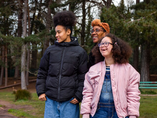 Mother with two daughters in park © Cultura Creative