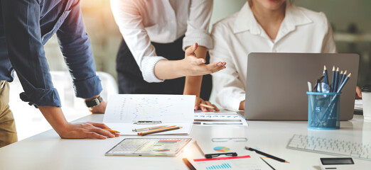 Cropped shot of diverse coworkers working together in boardroom, brainstorming, discussing and...