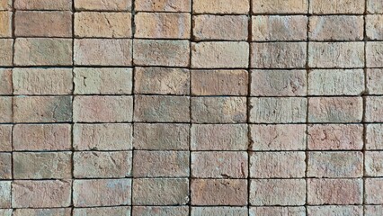 Old red brick wall for background.