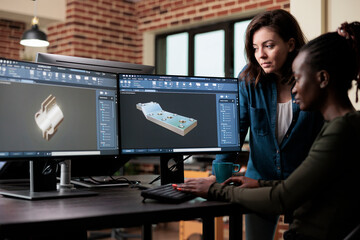 3D graphic artists sketching mechanical asset using advanced software technology. Modeling expert...