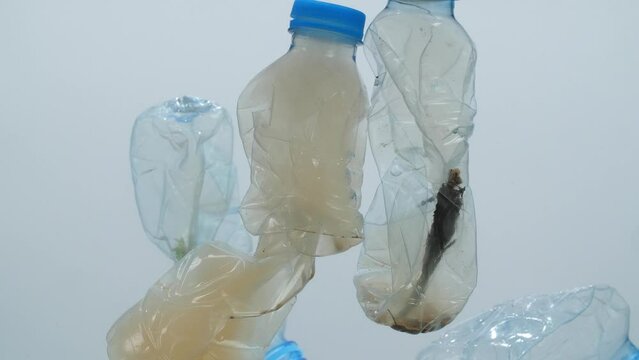 Underwater Footage Of Plastic Pollution Problem Concept In Ocean
