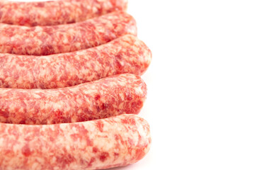 Five Fresh Raw Pork Bratwurst Isolated on a White Background