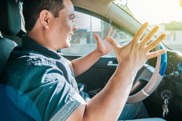 Impatient driver yelling, portrait of angry driver yelling in his car, stressed driver man yelling...