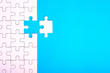 jigsaw puzzle pattern missing piece White jigsaw puzzle pattern top view to express alliance union team working solution success problem. Business assemble metaphor or puzzles game challenge.