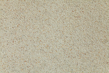 Abstract wall background. Colored and colorful plaster with mosaic pattern. Light surface with a chaotic loose pattern. Mosaic and granulated textured coating, texture, background