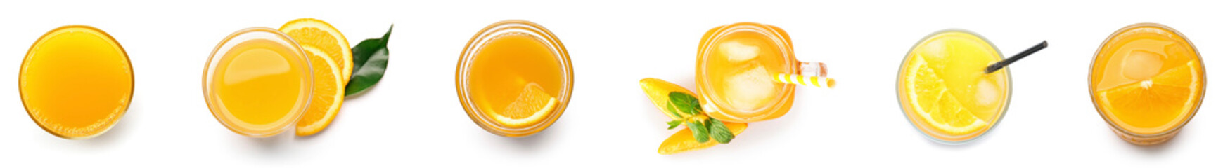 Many glassware of fresh orange juice on white background, top view
