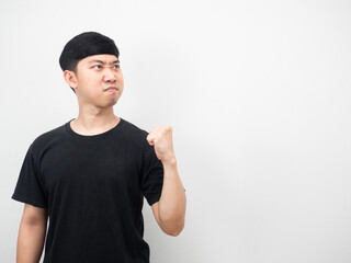 Fototapeta premium Man show fist up confident face looking at copy space