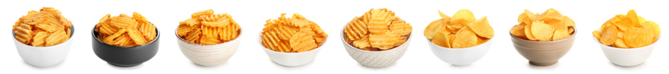 Set of bowls with tasty potato chips on white background