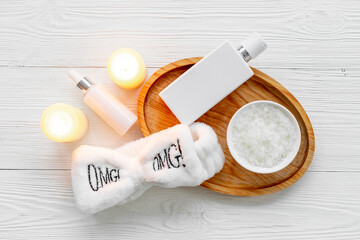 Set of white cosmetic products with bottle and tube, top view