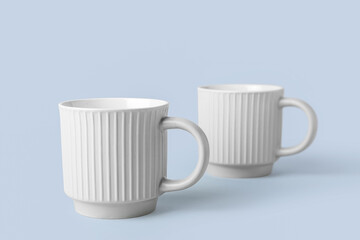 New ceramic cups on light background