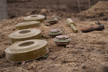 Demining by troops of the territory. Many mines, shells, artillery, grenades, fragmentation grenades.
