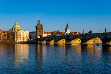 Fototapeta na wymiar Lesser Bridge Tower and a Charles Bridge in Prague ,Czech Republic .