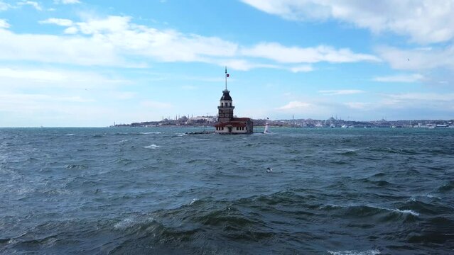 Maiden's Tower. Maiden's Tower or Kiz Kulesi in Istanbul with windy weather and wavy sea. Travel to Istanbul background video.