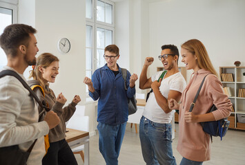 Excited multiethnic young people feel euphoric pass exam or test in university. Happy diverse...
