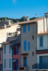 Fototapeta na wymiar Sunny day in South of France, walking in ancient Provencal coastal town Cassis, narrow streets and colorful buildings, Provence, France