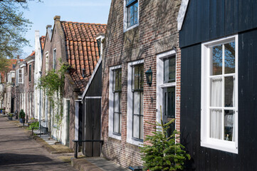 Fototapeta na wymiar Old streets and houses of historival Dutch town Enkhuizen, Horth-Holland, Netherlands