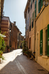 Fototapeta na wymiar Sunny day in South of France, walking in ancient Provencal coastal town La Ciotat, Provence, France