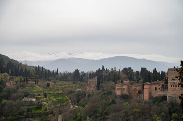 View on medieval fortress Alhambra and snow on Sierra Nevada mountains, Granada, Andalusia, Spain