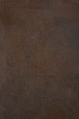 Dark Iron cast iron sheet with patina and rust used for background. Brown metallic texture . 