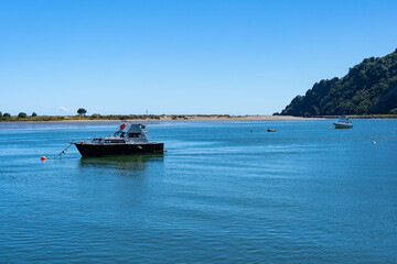 Fototapeta na wymiar Boats moored on the Whakatane Harbour in the Bay of Plenty town of Whakatane
